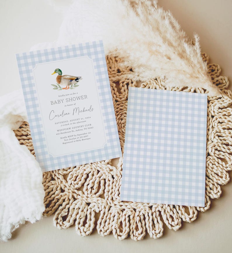 May include: A blue and white gingham baby shower invitation with a watercolor illustration of a duck. The invitation reads "Kindly join us for a baby shower in honor of Caroline Michaels, Saturday, August 31, 2024, 2 o'clock in the afternoon, Westview Country Club, 412 Henderson Dr, Aubrey, TX 76227. Kindly RSVP by September 1st.  Registered at Baby Boutique."