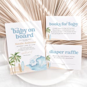 May include: Baby shower invitation with a blue and white watercolor wave design, palm trees, and surfboards. The invitation reads "Baby on Board" and includes the date, time, and location of the event. There are also two cards for guests to sign, one for a book and one for a diaper raffle.