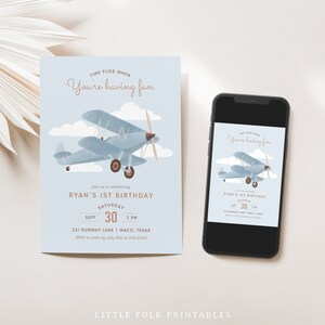 May include: A blue and brown airplane illustration with clouds in the background. The text "Time flies when you're having fun" is at the top of the invitation. The invitation is for Ryan's 1st birthday party on September 30th at 2 PM. The address is 321 Runway Lane, Waco, Texas. RSVP to Leah by July 31st at 555.5555.