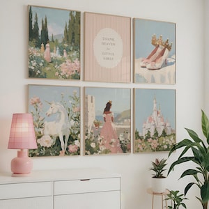May include: A collection of six framed art prints with a pastel color palette. The prints depict scenes of a garden, a unicorn, a princess, a castle, and a pair of shoes with a crown. One print has the text "THANK HEAVEN for LITTLE GIRLS".