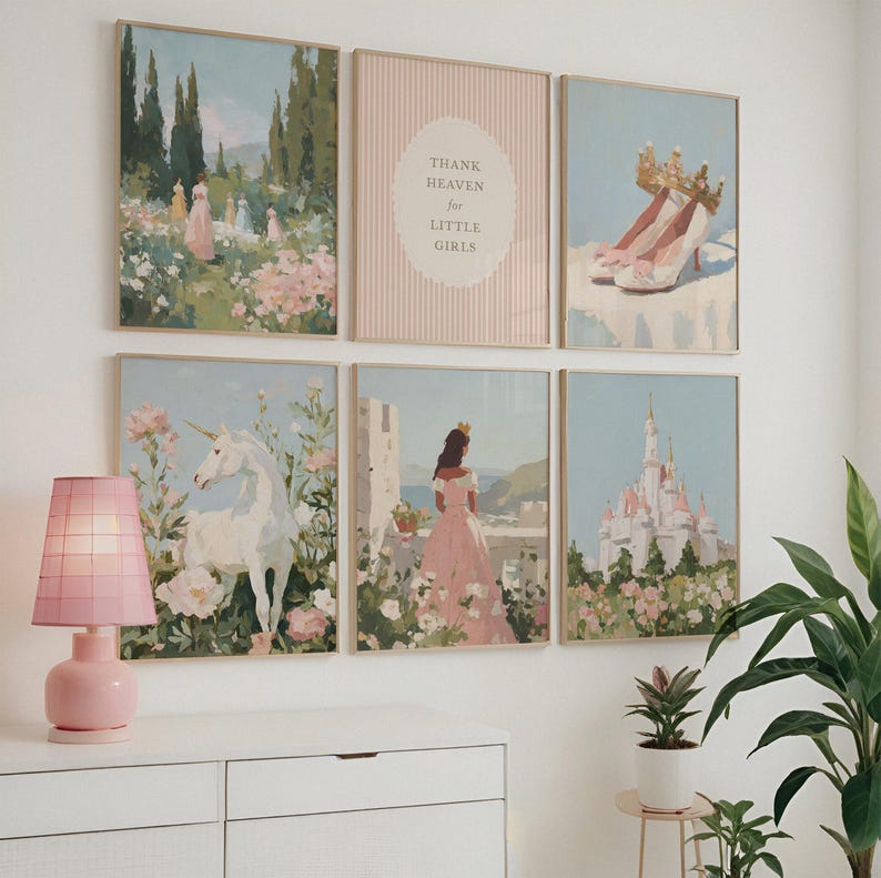 May include: A collection of six framed art prints with a pastel color palette. The prints depict scenes of a garden, a unicorn, a princess, a castle, and a pair of shoes with a crown. One print has the text "THANK HEAVEN for LITTLE GIRLS".
