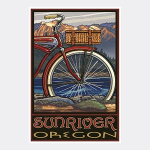 May include: A vintage red bicycle with a wicker basket on the handlebars, set against a scenic backdrop of mountains and a lake. The text "Sunriver Oregon" is printed below the image.