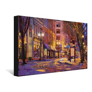 May include: A painting of a city street at night with buildings on both sides of the street. The street is lit by streetlights and there are trees on the right side of the street. The buildings are painted in a variety of colors, including yellow, orange, and red. The street is paved with cobblestones and there is a bus stop on the right side of the street.