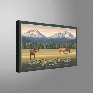 May include: A canvas print featuring a landscape scene with brown horses grazing in a field. The background shows snow-capped mountains, a forest, and the text "SUNRIVER OREGON" in a vintage style.