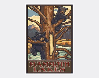 May include: A vintage-style poster featuring two black bear cubs in a tree. The bears are perched on branches of a brown tree, with a river and mountains in the background. The text "MAMMOTH LAKES" is at the bottom.