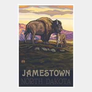 May include: A vintage travel poster featuring a brown bison and a calf standing in a grassy field with mountains in the background. The text "JAMESTOWN NORTH DAKOTA" is at the bottom of the poster.