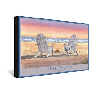 May include: A watercolor painting of two white wooden chairs on a beach with a small fire in between them. The sky is a vibrant orange and pink sunset. The text "Tybee Island, Georgia" is at the bottom of the painting.