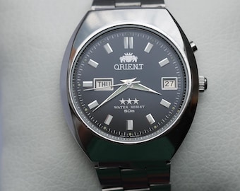 Orient watch, Vintage orient watch, Japan Stainless Steel Watch, Automatic Watch, Day and date calendar.