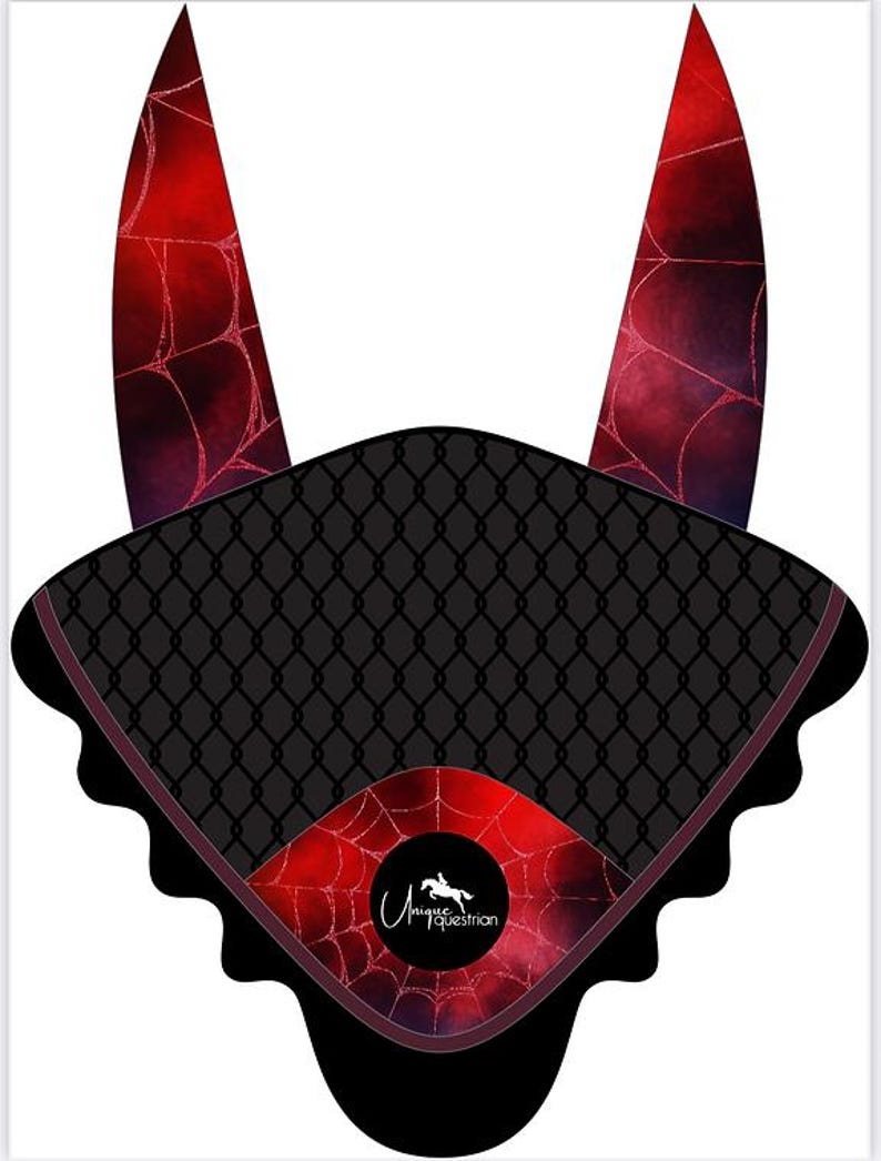May include: A black and red equestrian fly bonnet with a spiderweb design. The bonnet features a black diamond-patterned mesh over the ears and a red and black patterned fabric on the front. The logo "Unique Equestrian" is visible.