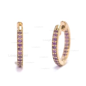 Huggie-ringoorbellen met roze saffier: 14 kt geelgoud