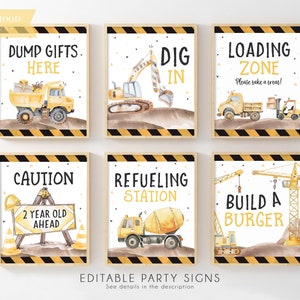 May include: Six printable construction party signs with yellow and black stripes. The signs feature illustrations of construction vehicles and text such as "Dump Gifts Here", "Dig In", "Loading Zone", "Caution 2 Year Old Ahead", "Refueling Station", and "Build a Burger".