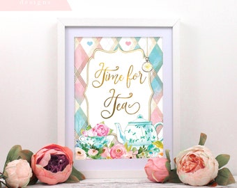 May include: A framed printable sign with a pink and blue checkered background. The sign says "Time for Tea" in gold script with a teapot and teacup illustration.