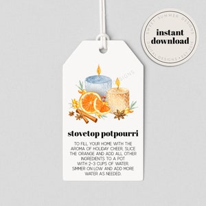 May include: A printable tag featuring a watercolour illustration of two candles, oranges, cinnamon sticks, and star anise. The text on the tag reads "stovetop potpourri" and includes instructions for making a stovetop potpourri.