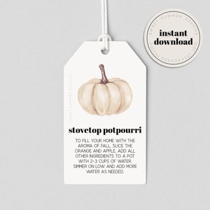 May include: A printable tag with a watercolor illustration of a white pumpkin. The text on the tag reads "stovetop potpourri" and includes instructions for making a fall-scented potpourri.