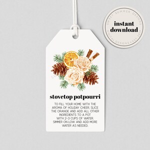 Peut inclure: Etiquette cadeau imprimable avec une illustration aquarelle de tranches d'orange, de bâtonnets de cannelle, d'aiguilles de pin et de roses blanches. Le texte sur l'étiquette indique "Stovetop Potpourri" et comprend des instructions pour faire un pot-pourri de cuisinière.