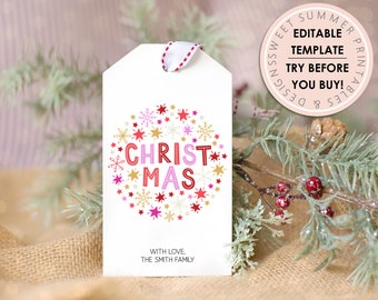 Peut inclure: Étiquette cadeau blanche avec un motif d'étoiles et de flocons de neige rouges, roses et dorés. Le texte "CHRISTMAS" est en lettres rouges et roses. L'étiquette comprend également le texte "WITH LOVE, THE SMITH FAMILY".