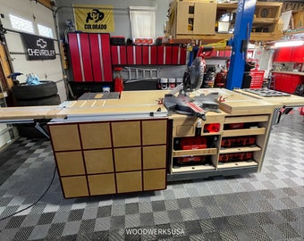 May include: A custom-built woodworking station with a miter saw, a pull-out extension table, and a storage cabinet with multiple drawers. The station is made of wood and has a red and brown color scheme.