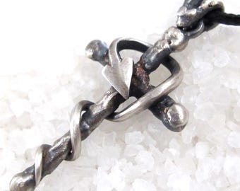 Pendant Cross, sacred serpent, oxidized cast silver