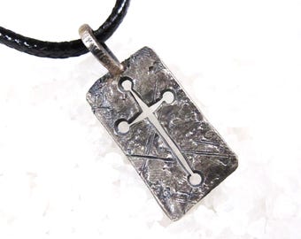 Brutalist sacred man cross in oxidized cast silver