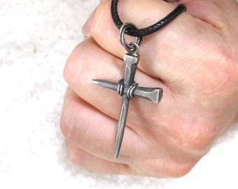 Men's silver cross, rough forged nail