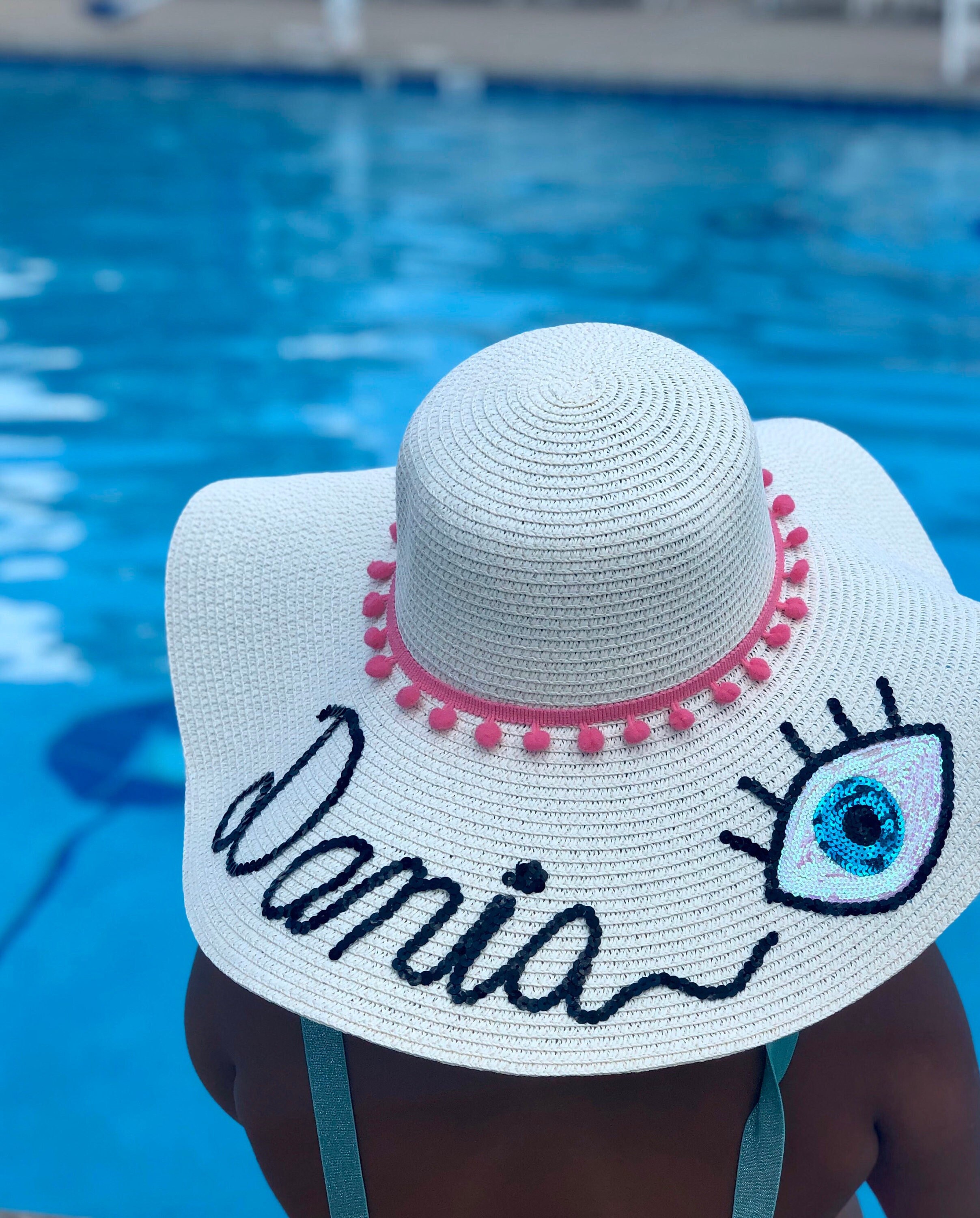 Yosuzi blue and black woven sun hat with blue pom poms Yosuzi main image 3