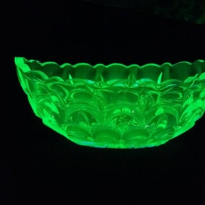 Vintage uranium glass. Bagley Salisbury-style glass boat vase. pressed Vaseline glass. starburst base. art deco.