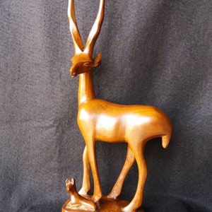 LARGE Teak antelope and calf. carved figurine. 1960s. mid century home. long horns. antelope group. African carving