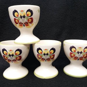 Vintage egg cups. Folksy pattern. Ceramic set of four. Breakfast. Colourful pattern