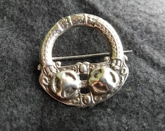 Vintage Silver Celtic brooch. marked silver. Collectors piece. hoop and target motif. heavy item.