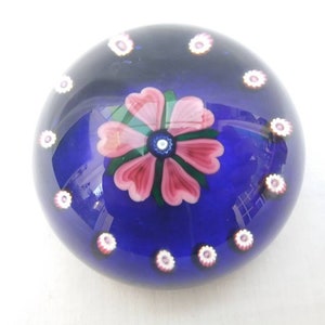 Superb Selkirk glass paperweight . Signed and dated. 1982. flower and murrines over cobalt blue ground. edition no 173 of 250