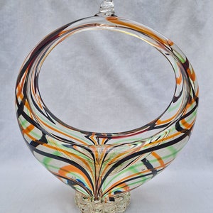 vintage Romanian glass basket bowl. green ornage and black canes. sommerso. footed bowl. mid century glass.