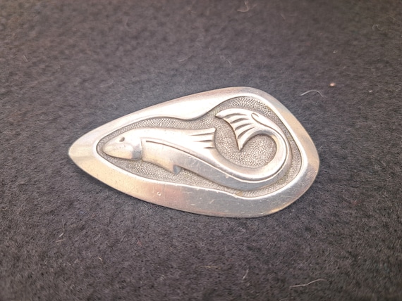 Vintage pewter brooch by CEARD of Scotland. LOCH FYNE design, leaping salmon. 1970s.