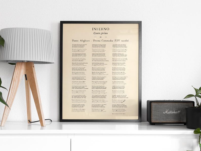 May include: Framed print of Inferno, Canto Prims, from Dante Alighieri's Divine Comedy. The text is in Italian, with a vintage paper background and a black frame. The print is displayed on a white surface.
