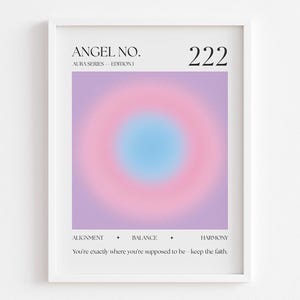 May include: White framed print with the text "ANGEL NO. 222" and "AURA SERIES - EDITION 1". The artwork features a soft, colorful gradient of pink, purple, and blue. The bottom of the print includes the words "ALIGNMENT", "BALANCE", and "HARMONY".