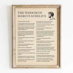 May include: Framed print featuring the text "The Wisdom of Marcus Aurelius" with a bust of a man. The print has a vintage aesthetic with a beige background and a wooden frame. The text is in black, and the frame is a light brown color.