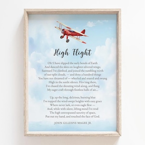 May include: A framed print featuring a watercolor illustration of a red biplane soaring in a blue sky with clouds. The text "High Flight" is above a poem by John Gillespie Magee Jr. The frame is a light wood color.