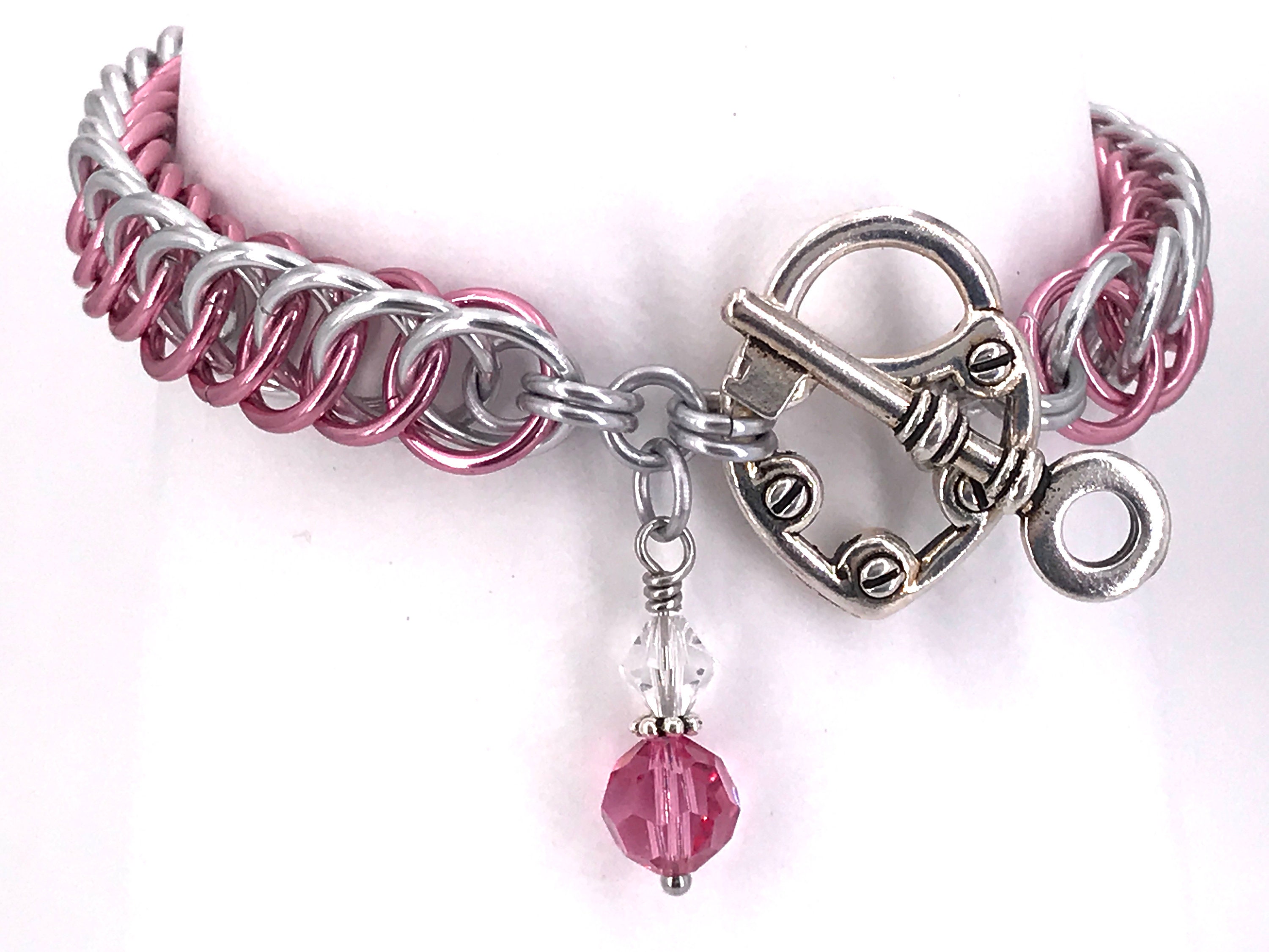 Caroline x H.E.L.P. Seashell Charm with Pink Glass Shimmer Charity Bracelet