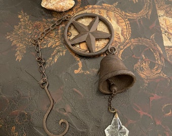 Star Sun Catcher/Wind Chime Made From Cast Iron, Bell, and a Vintage/Tuscan Chandelier Crystal.