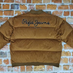 May include: A brown corduroy puffer jacket with a black embroidered "Pepe Jeans London" logo on the back.