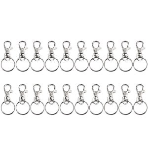 May include: Twenty silver-toned keychains with a swivel clasp and a round ring. The keychains are arranged in two rows of ten.