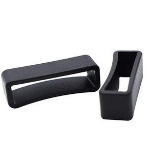 May include: Two black rubber watch strap keepers. The keepers are rectangular with rounded edges and a slot in the middle.