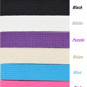 May include: Cotton webbing in six colors: black, white, purple, beige, blue, and pink.  Cotton webbing is a type of fabric used for straps, belts, and other applications.