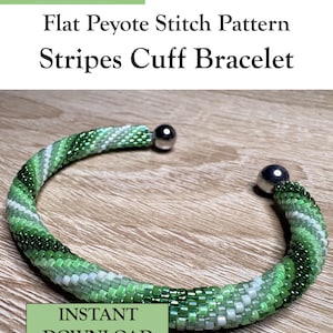May include: A PDF pattern for a flat peyote stitch stripes cuff bracelet by Selina's Beading. The intermediate skill level design features a beaded cuff with diagonal stripes in shades of green and white, finished with silver-toned metal end caps.