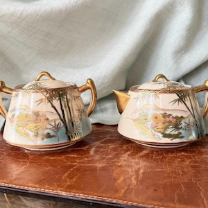 Japanese Satsuma Creamer and Sugar Bowl Koshida Meiji Period Hand Painted Satsuma With Bamboo Forest and Village Design Hand Signed PC4136