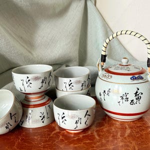 Japanese Kutani Tea Set 9 Piece Hand Painted Pottery Tea Set Lidded Teapot and 6 Cups Enamel Flower and Calligrapy Haiku Design PC4249