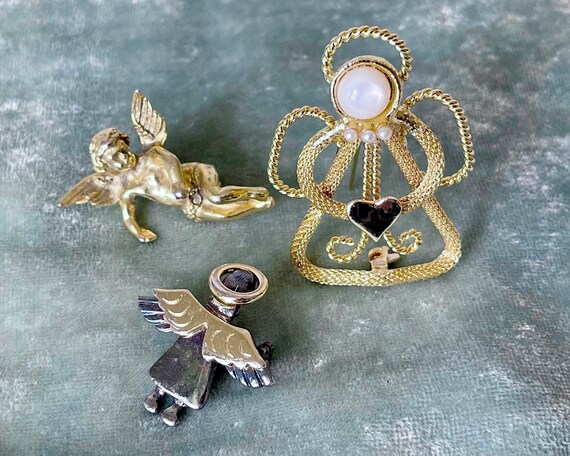 Vintage angel pins best sale brooches