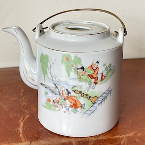 Antique Japanese Porcelain Teapot from the 1930’s with Brass Handle and a Famille Verte Children at Play Landscape Scene PC2396