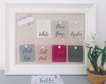 White framed fabric covered notice board / pin board