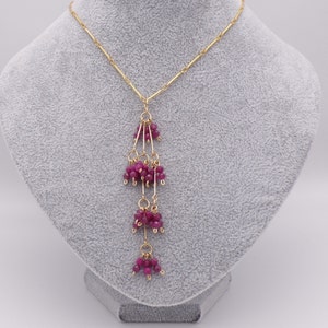 Collar strands of rubies