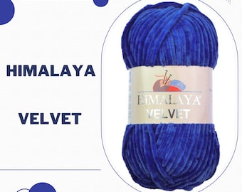 May include: A skein of blue Himalaya Velvet yarn. The yarn is soft and fluffy, and it is perfect for knitting or crocheting.